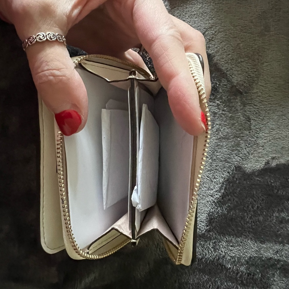 Brand new with tags. Kate Spade purse and wallet